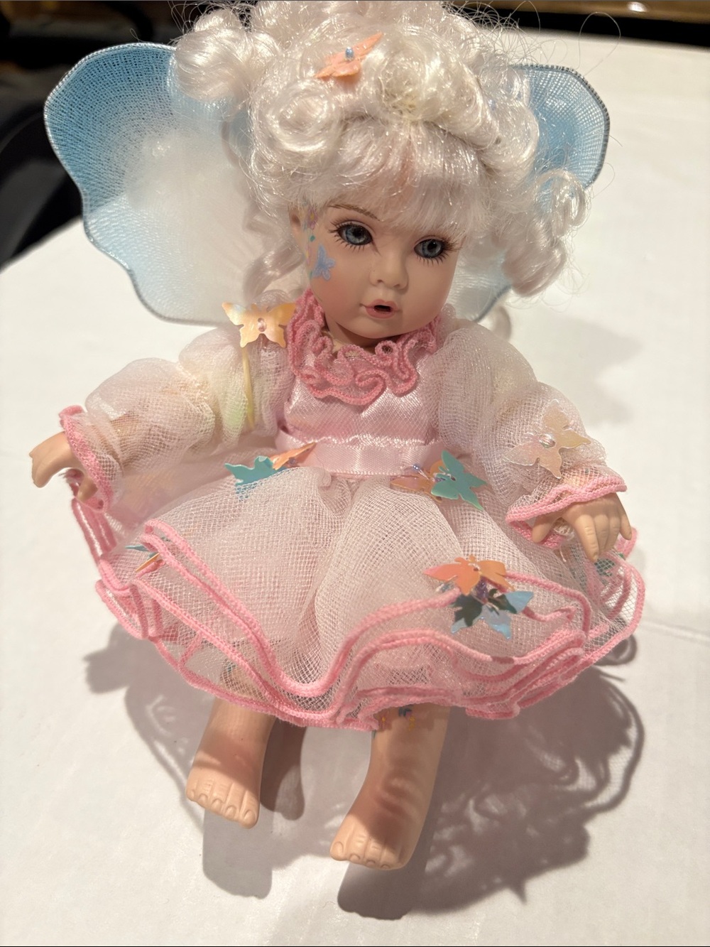 Porcelain Fairy Doll in Pink Dress with Blue Wings